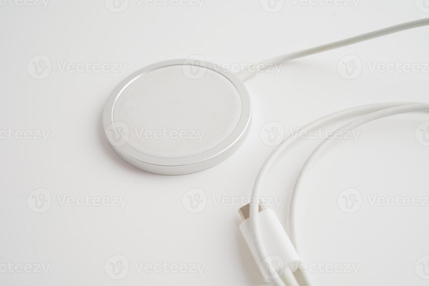 Wireless charger, magnetic charging modern equipment of mobile phone. photo