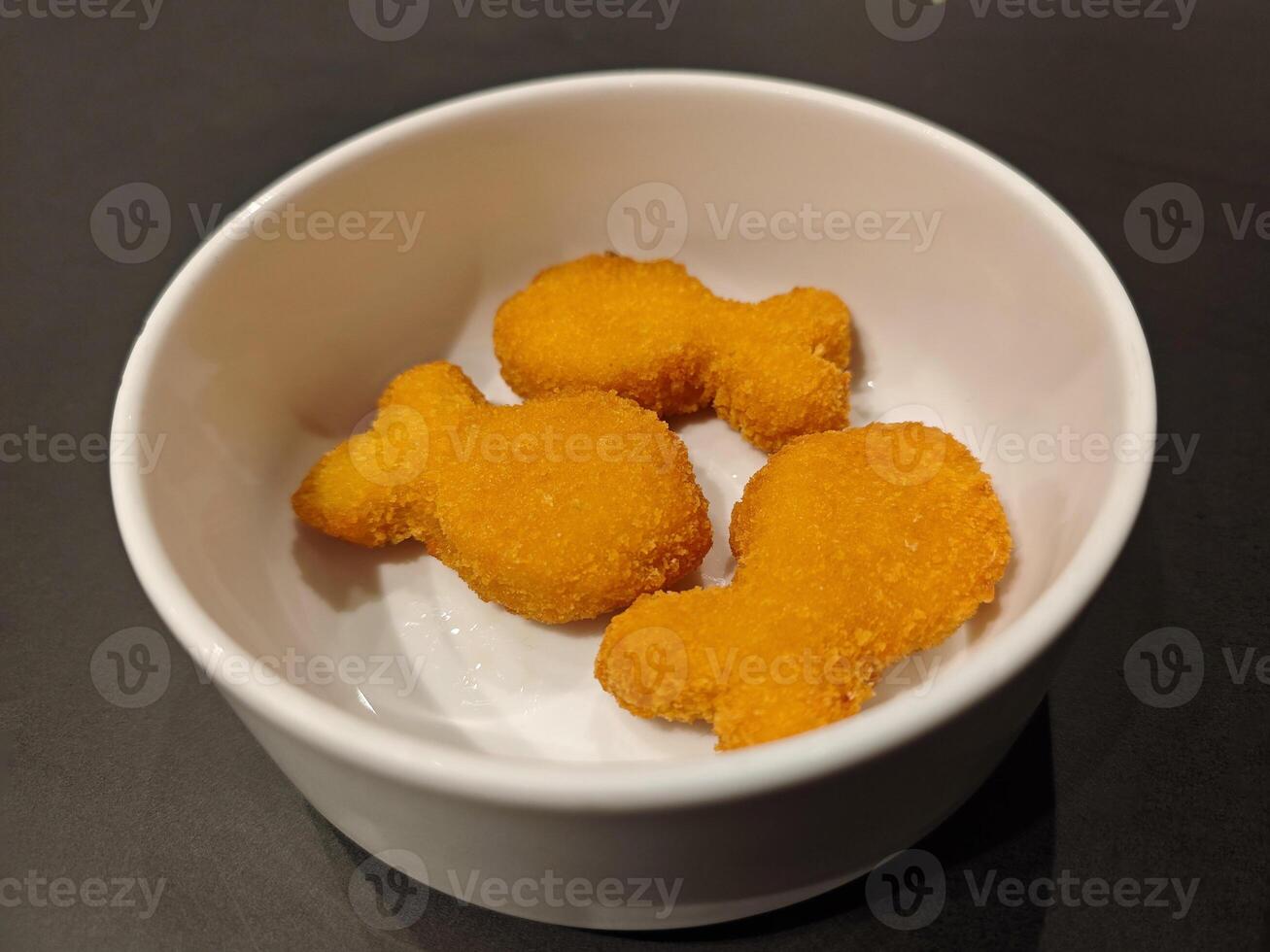 Crispy Fish Shaped Chicken Nuggets for the kid menu. photo