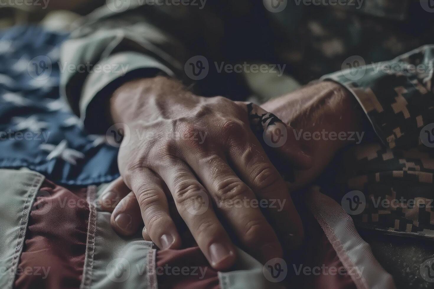 A man in a military uniform is holding a hand on a flag photo