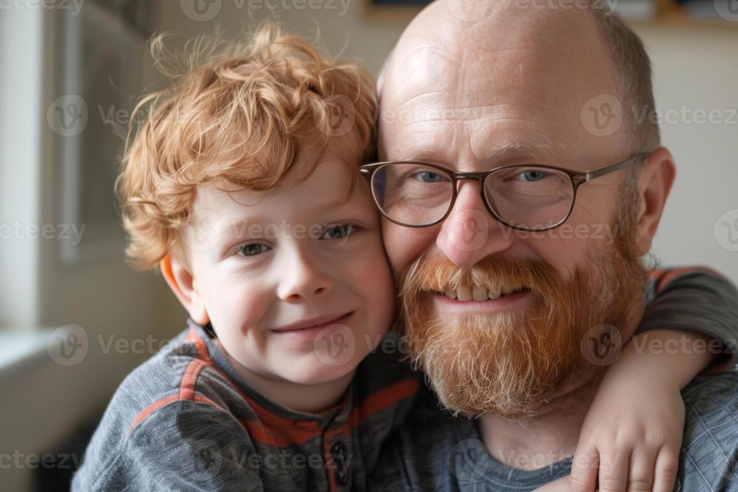 Father and son are hugging each other photo