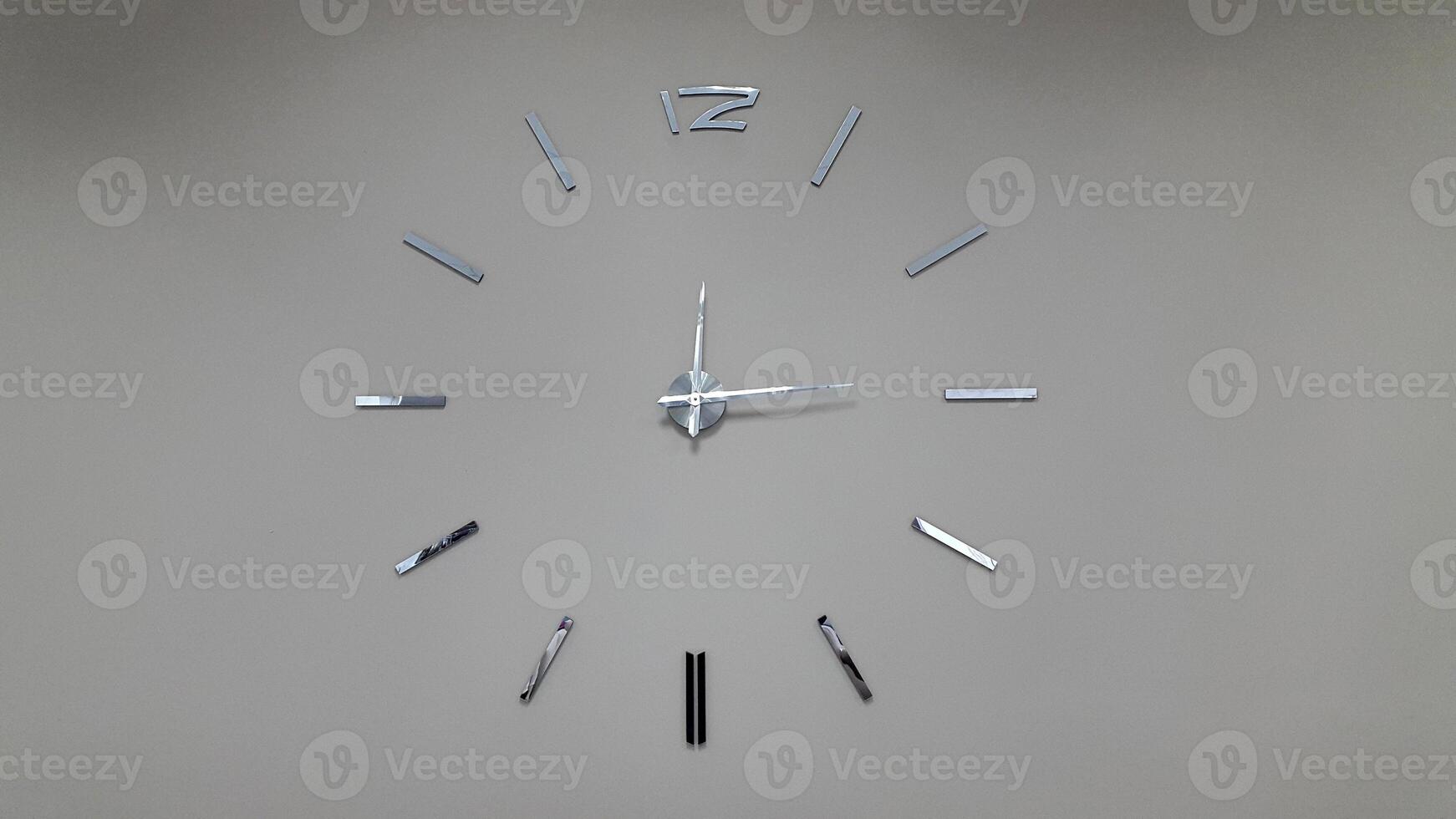 Clock face. The dial on the clock. Wall clock with arrows photo