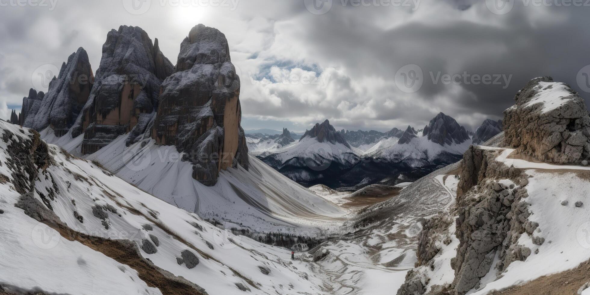 Cloud day rock hill mountain rock peak with snow at winter. Adventure expedition travel hiking scene view photo