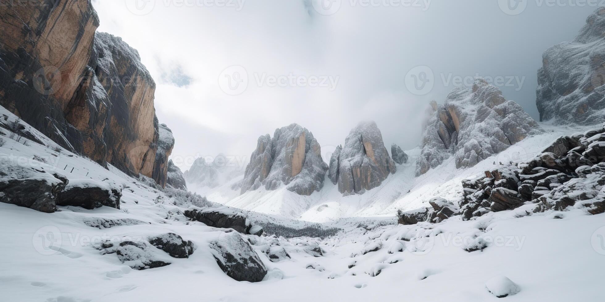 Cloud day rock hill mountain rock peak with snow at winter. Adventure expedition travel hiking scene view photo