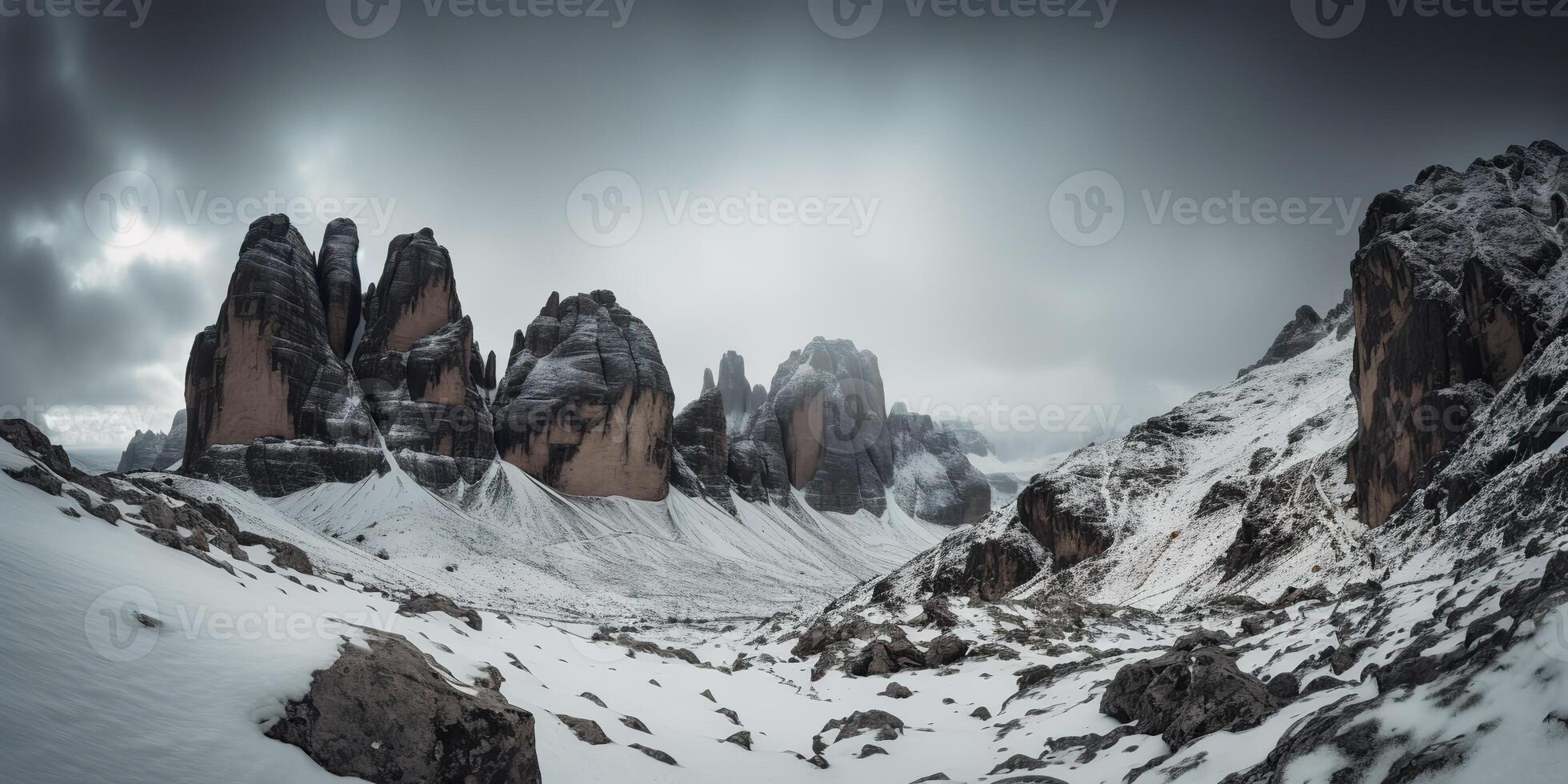 Cloud day rock hill mountain rock peak with snow at winter. Adventure expedition travel hiking scene view photo