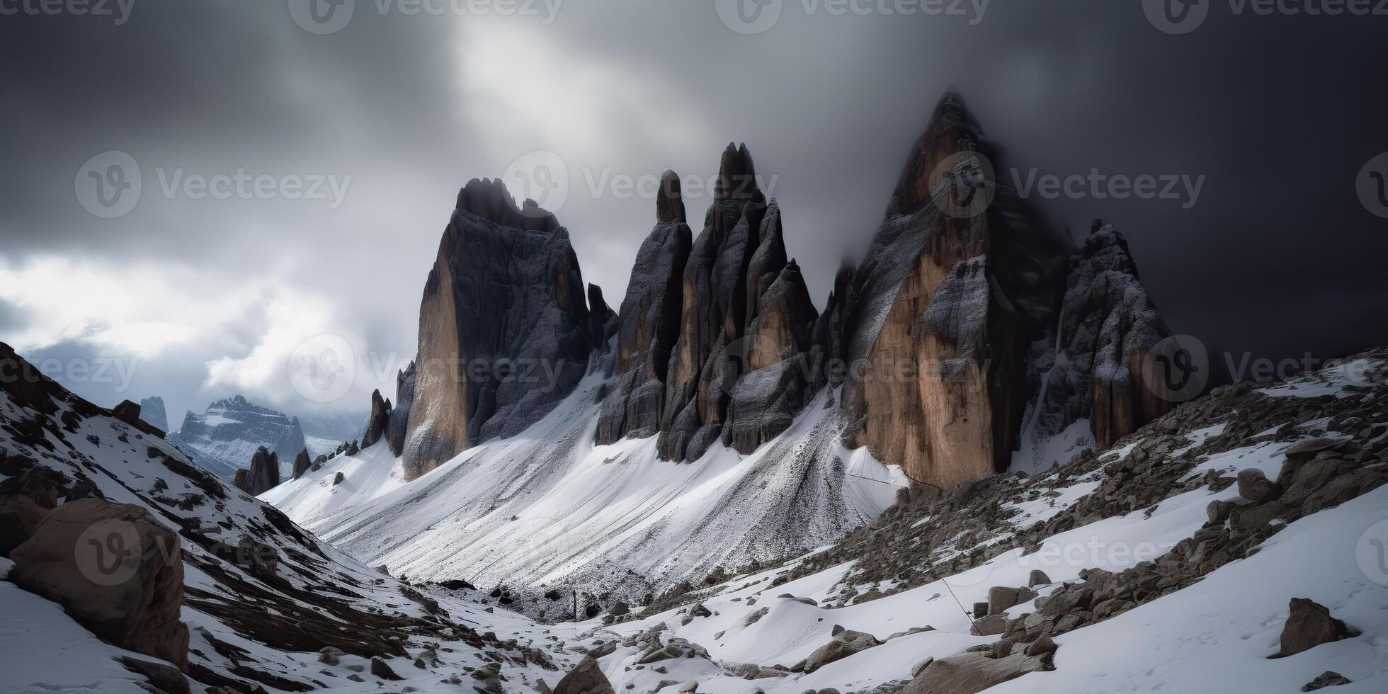 Cloud day rock hill mountain rock peak with snow at winter. Adventure expedition travel hiking scene view photo