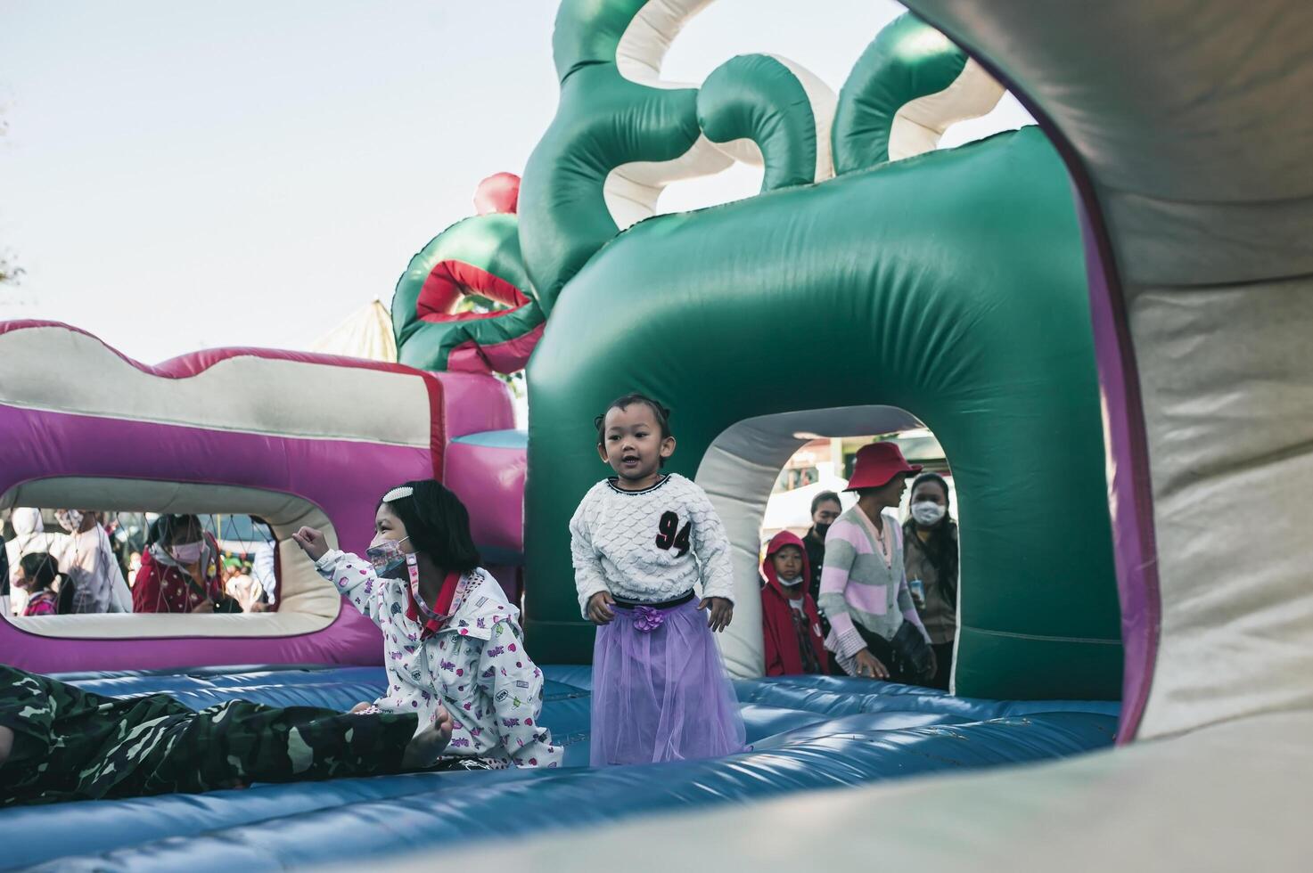 Chiang Mai, Thailand - January 14, 2023 Children's Day activities in Thailand in January of every year include snacks, food, dancing, and various rides. photo