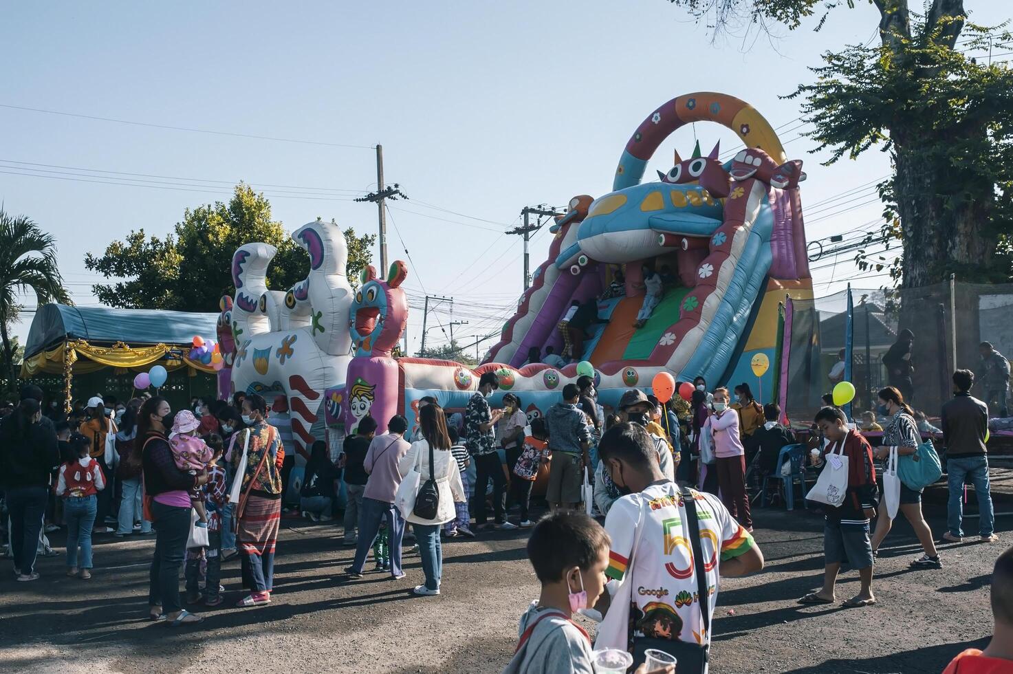 Chiang Mai, Thailand - January 14, 2023 Children's Day activities in Thailand in January of every year include snacks, food, dancing, and various rides. photo