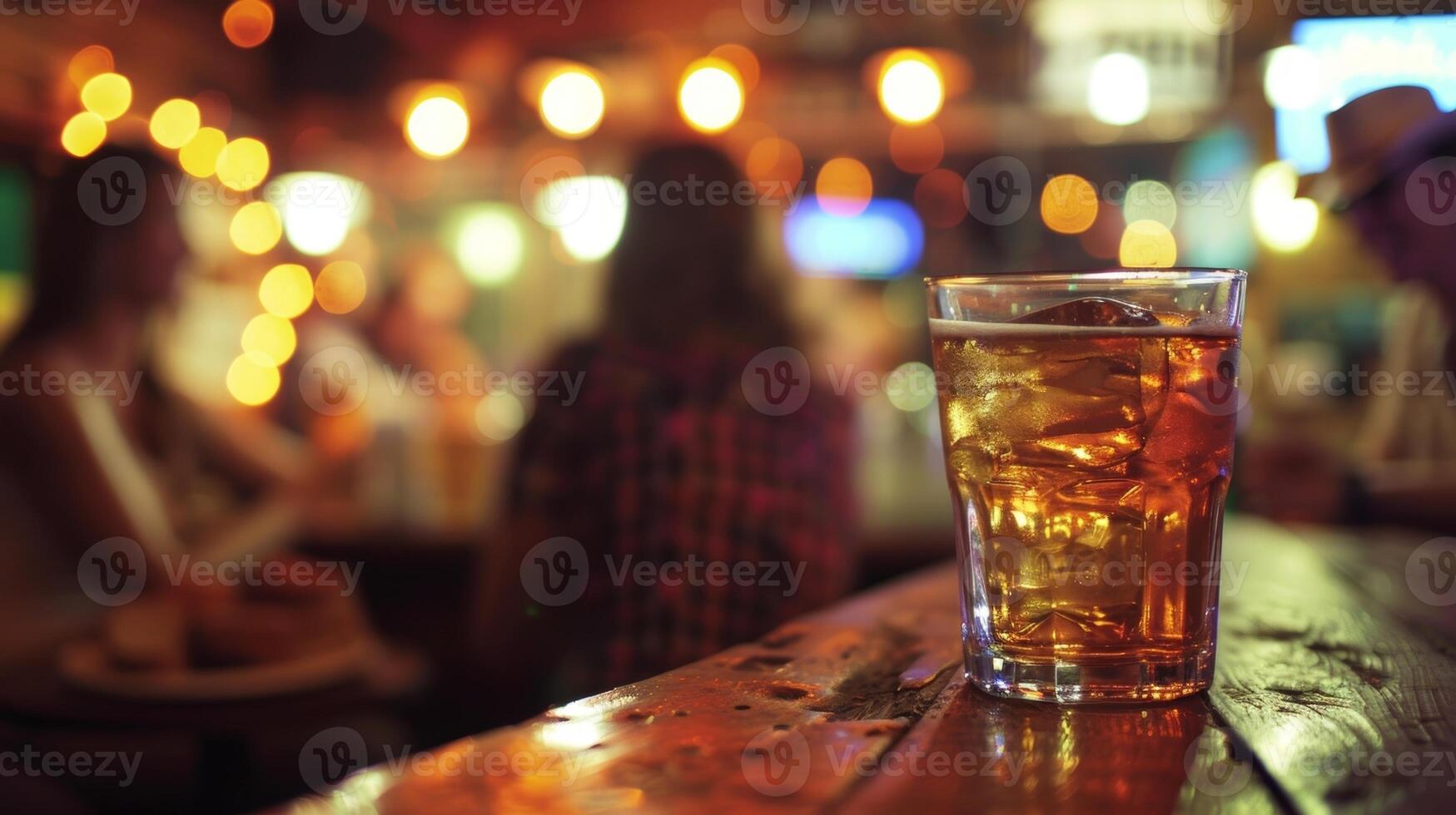 A karaoke session at a saloon as the ladies belt out country music hits and enjoy delicious BBQ finger foods photo