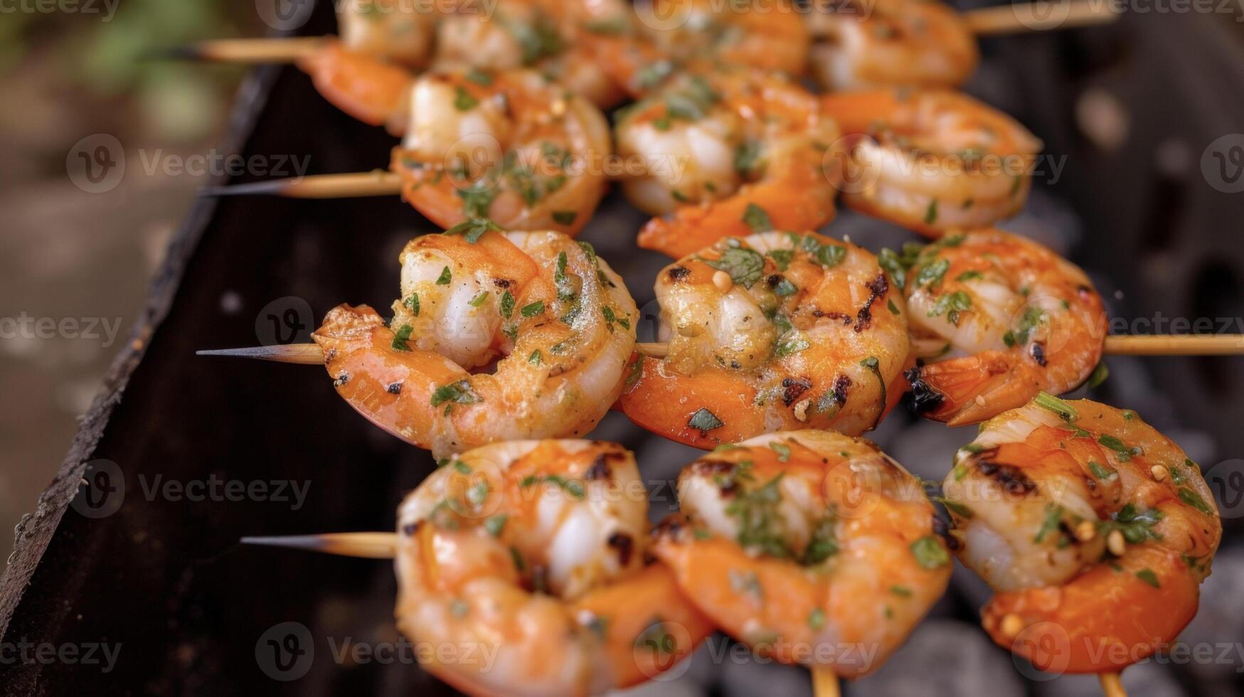 A delicious melody of colors textures and tastes emerge from these campfire shrimp skewers. Each bite reveals a perfectly cooked shrimp enhanced by the bold blend of herb photo