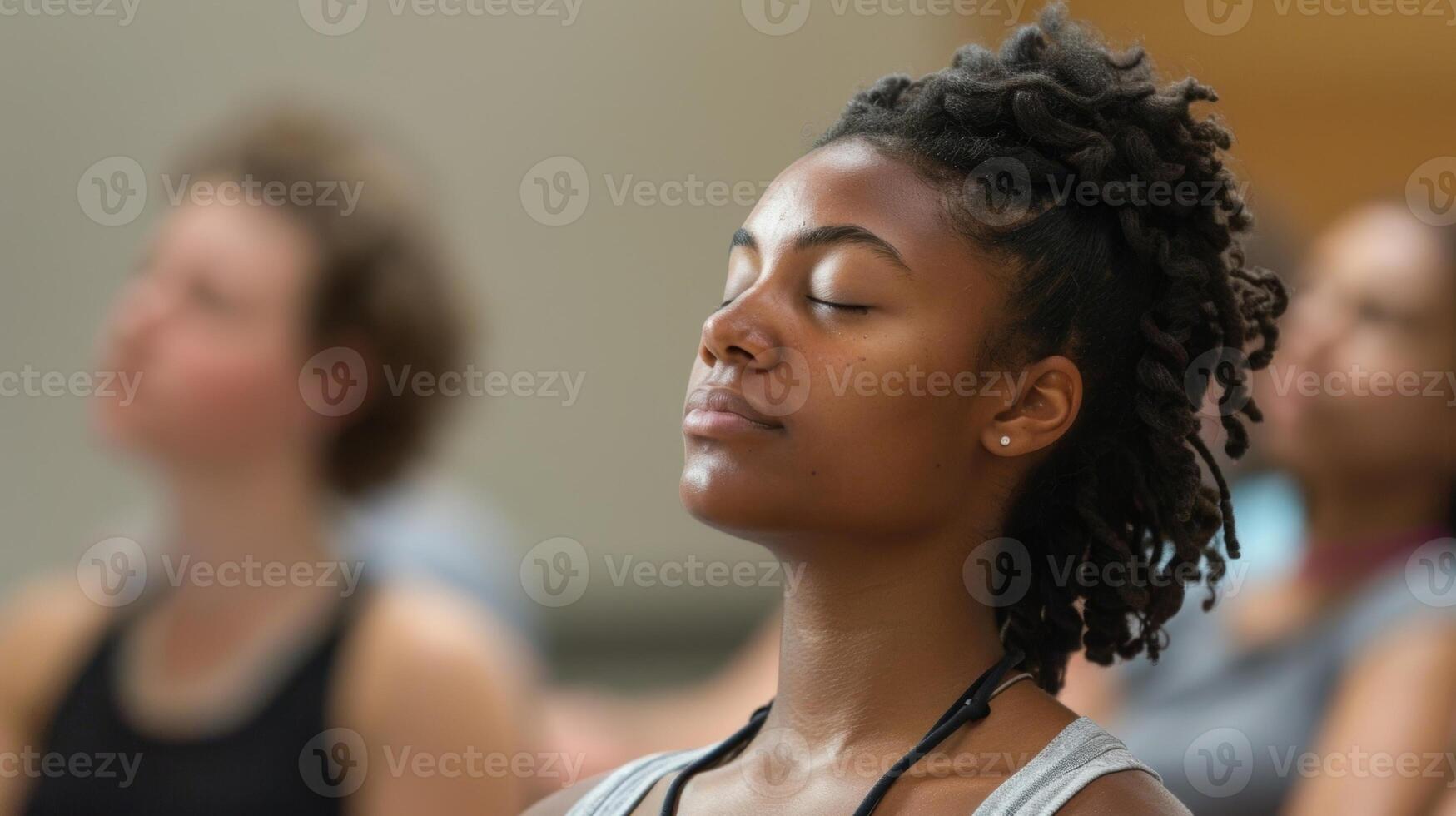 Soft spoken words guide the participants through a series of muscle relaxation exercises releasing tension and stress. photo