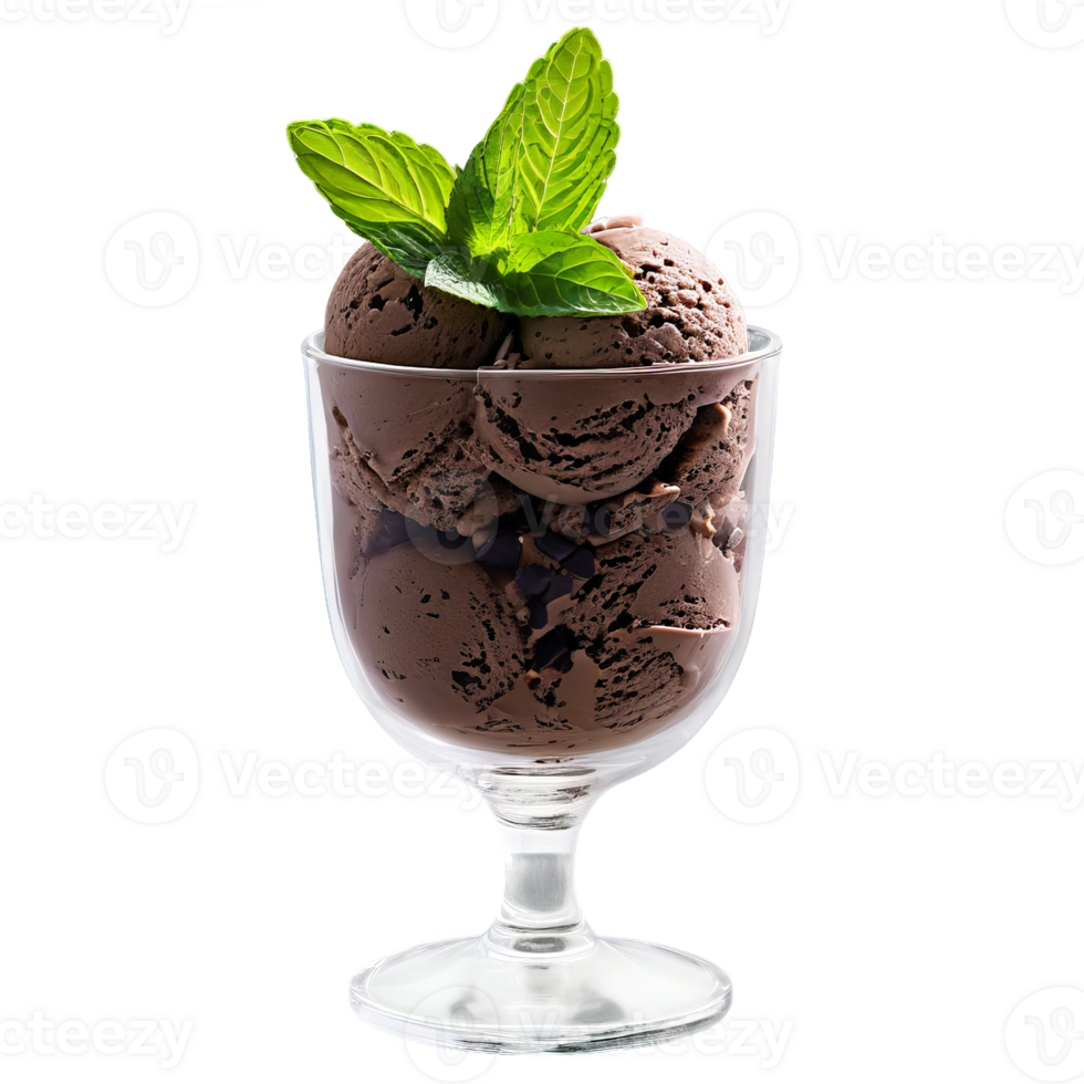 Mint chocolate chip ice cream in a clear glass parfait dish with a