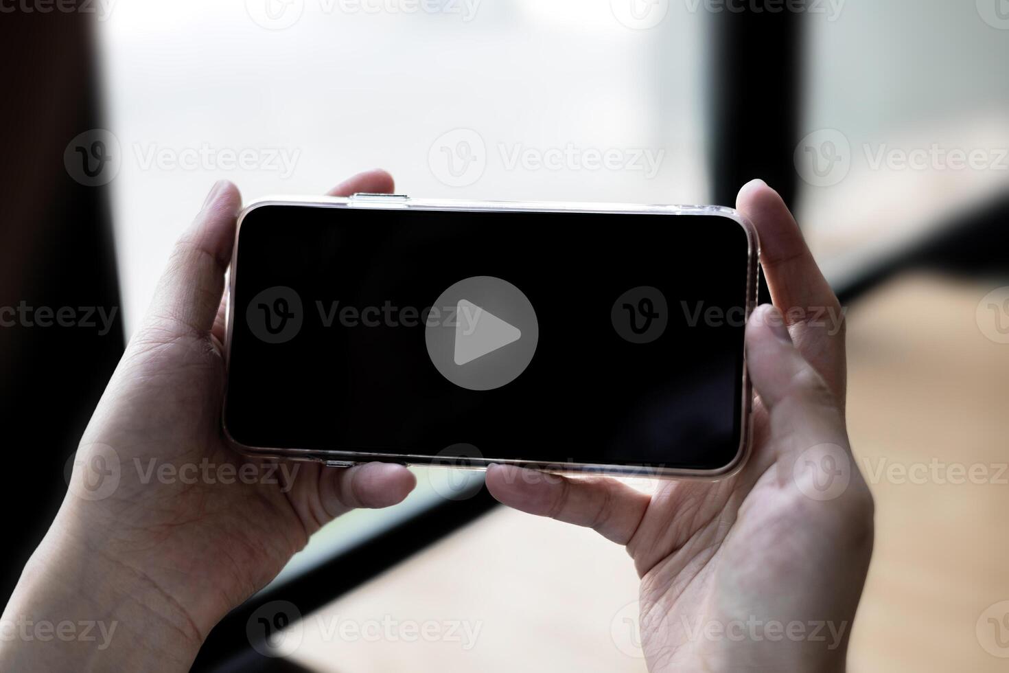 Modern multimedia concept. content creation online streaming Popular internet, monetization, social media. Woman watches in online media applications on smartphone photo