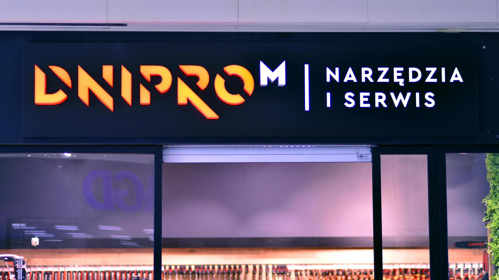 Warsaw, Poland. 28 April 2024. Sign Dnipro M. Company signboard Dnipro M. photo