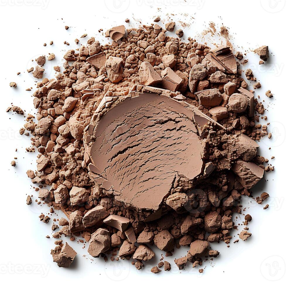 Brown powder isolated on white background with shadow. Brown powder pigment top view. Brown powder for eyeshadow use photo