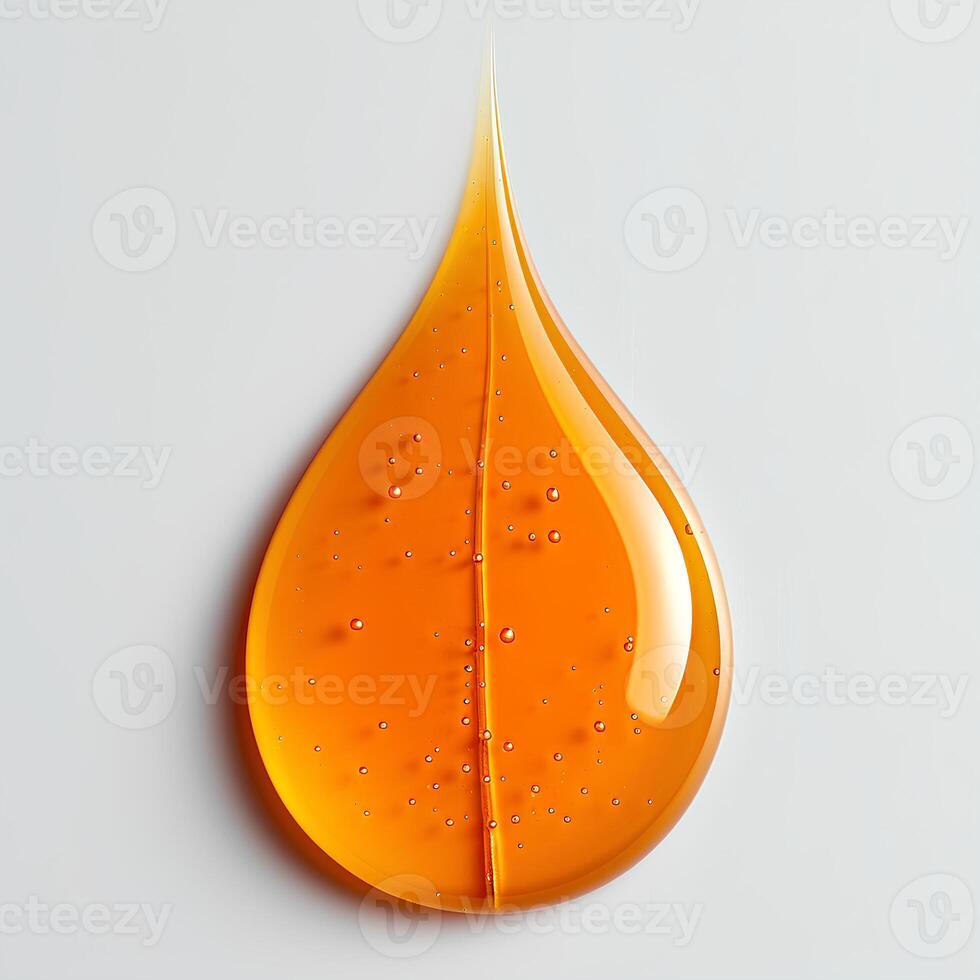 orange paint drop isolated on white background with shadow. orange paint explosion photo