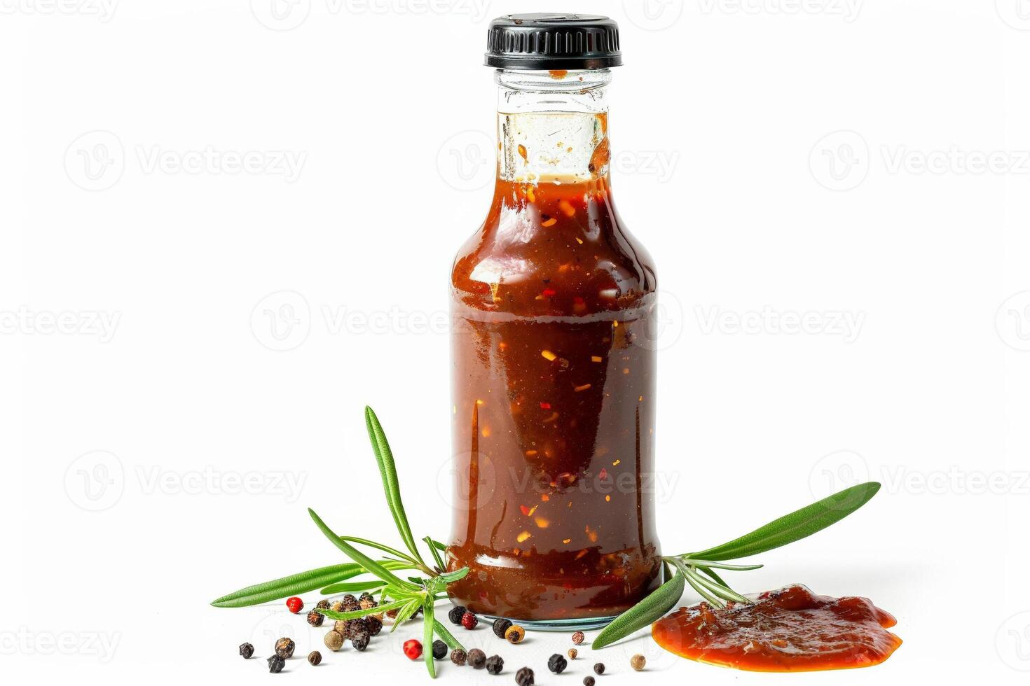 Bottle of tangy barbecue sauce with herbs and spices visible, isolated on a white backdrop photo