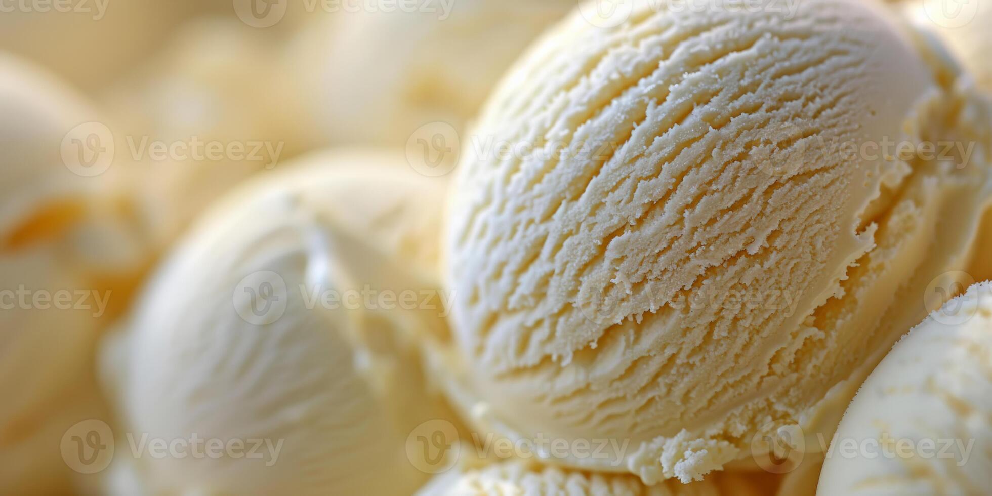 Close up of creamy vanilla ice cream scoops, perfect for summer treats and dessert concepts, with a focus on texture and indulgence photo