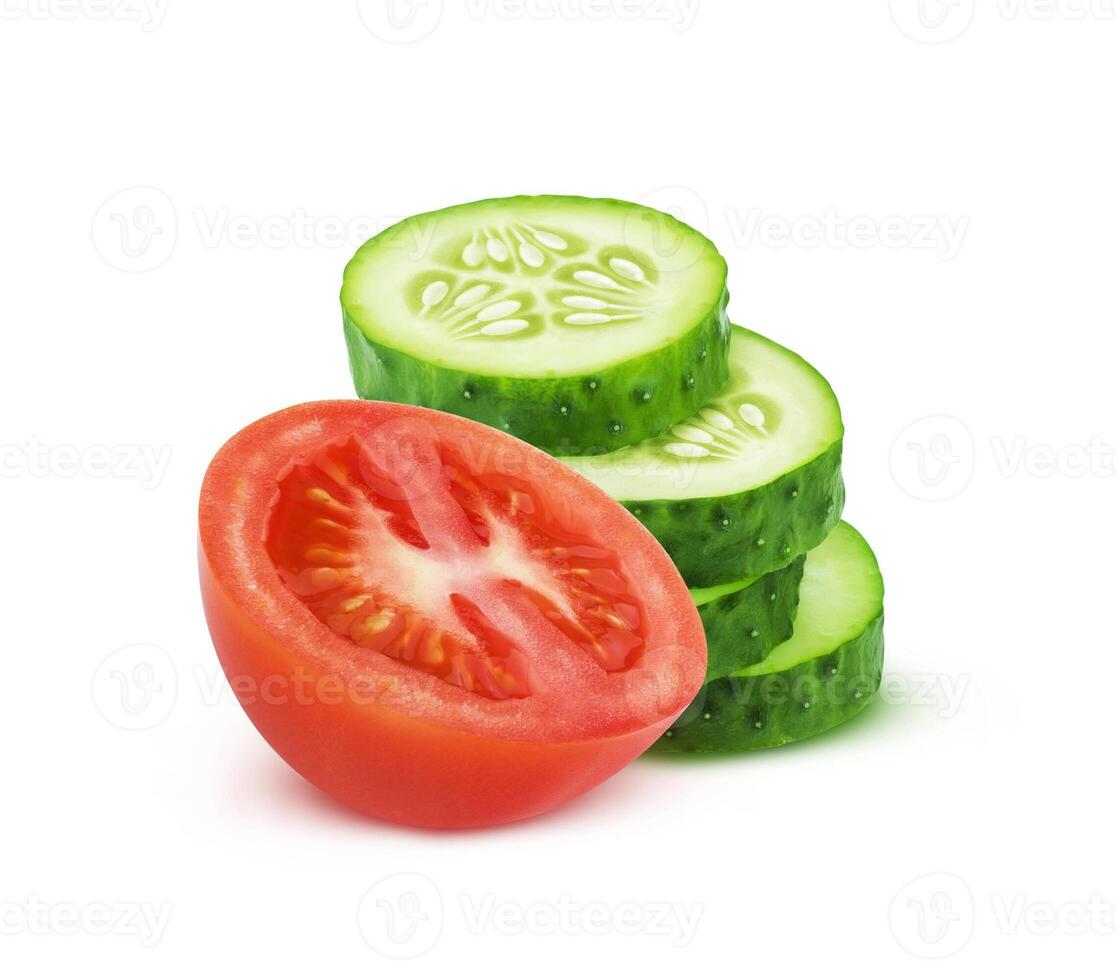 Fresh tomato and sliced cucumber isolated on white background photo