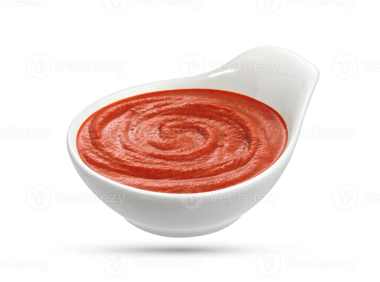 Ketchup bowl on white photo
