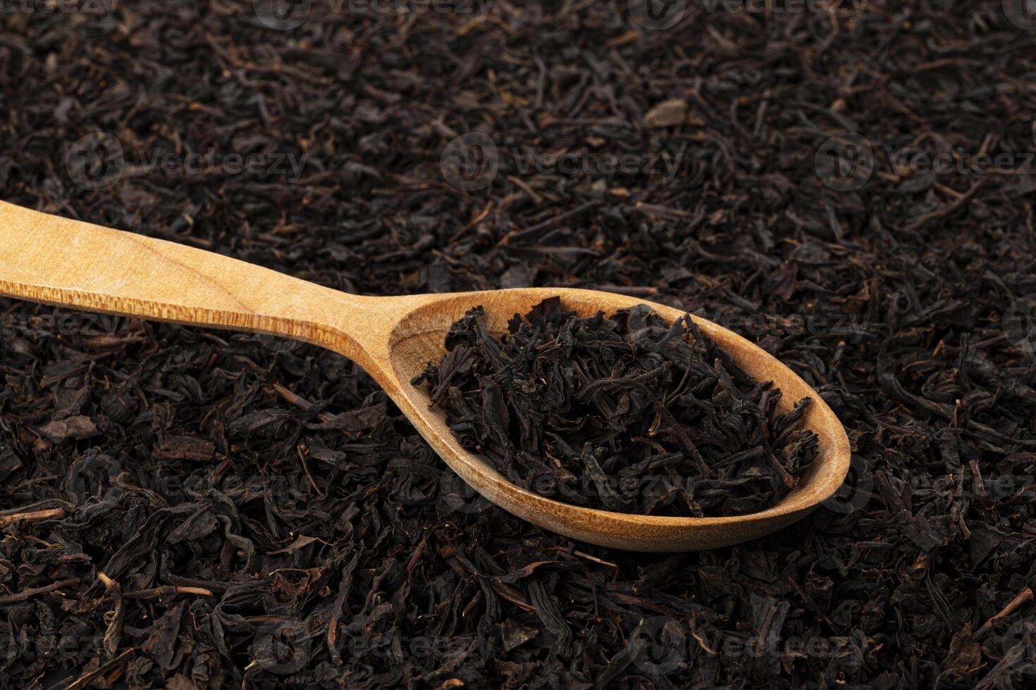 Dry tea leaves background or texture, black tea pattern photo