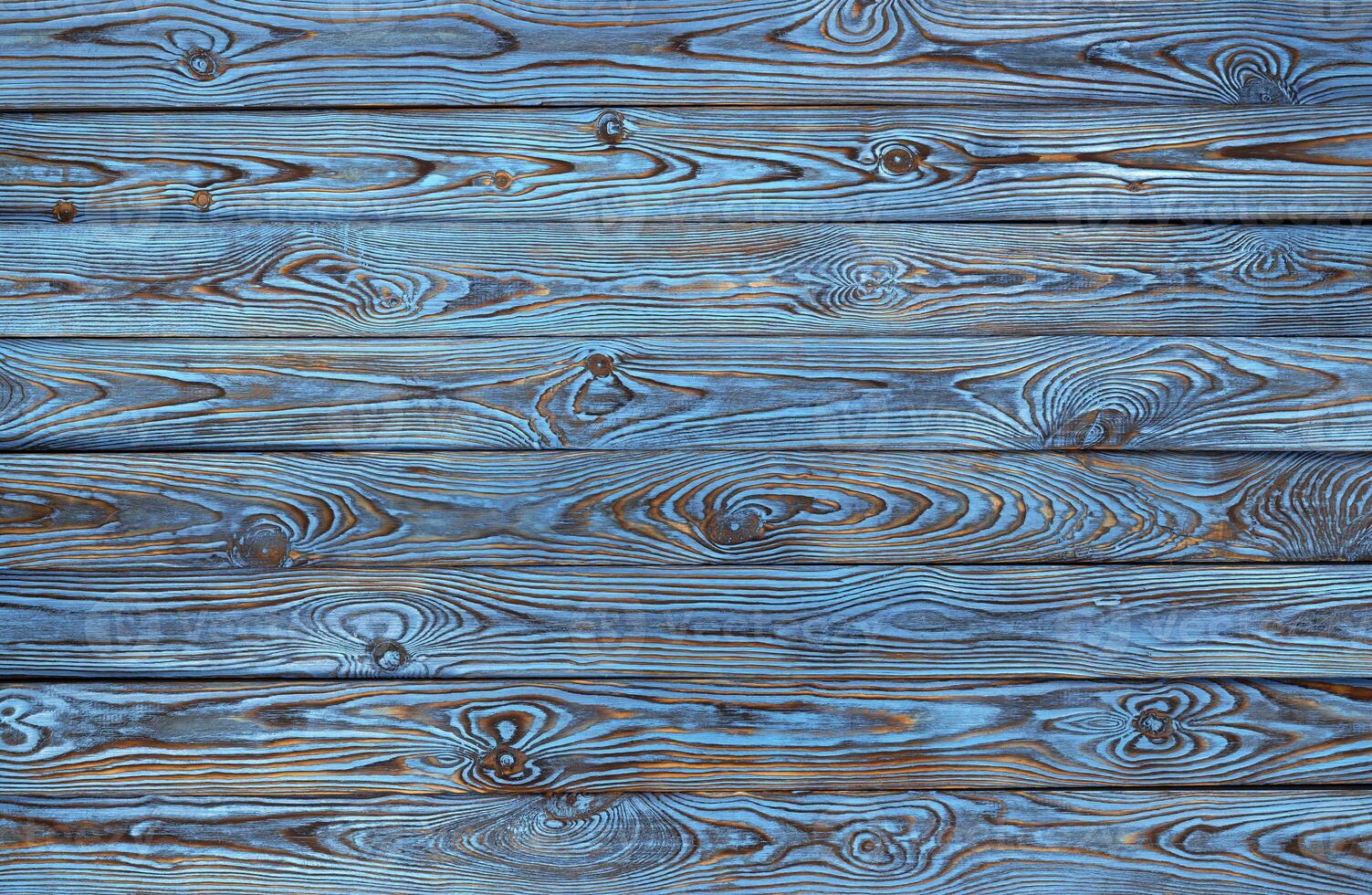 Blue wooden planks background, old and grunge blue colored wood texture photo