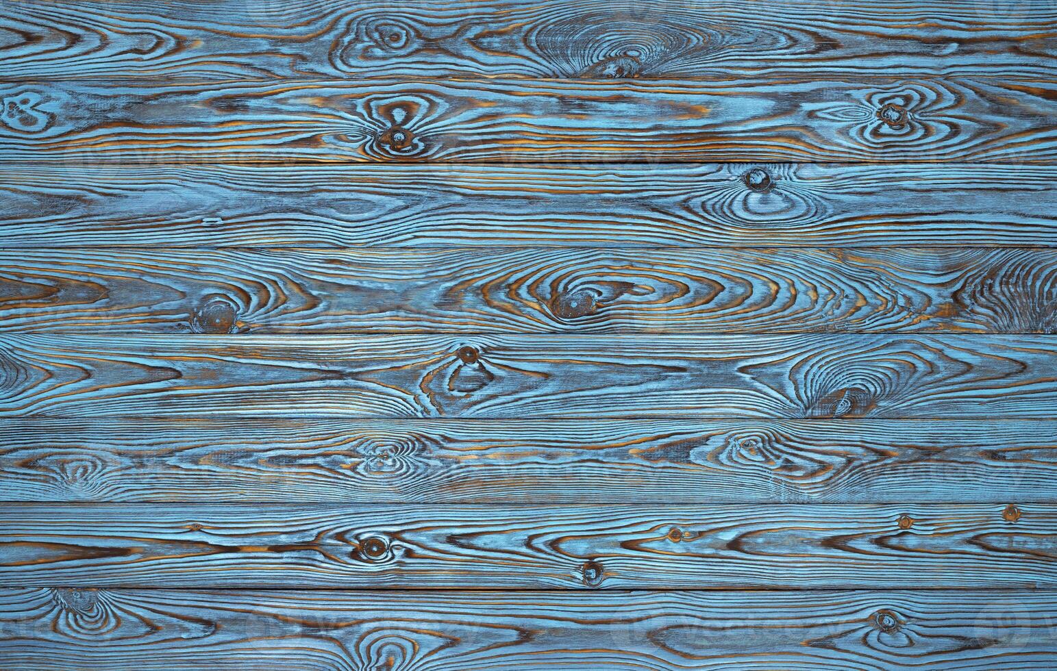 Blue wooden planks background, old and grunge blue colored wood texture photo