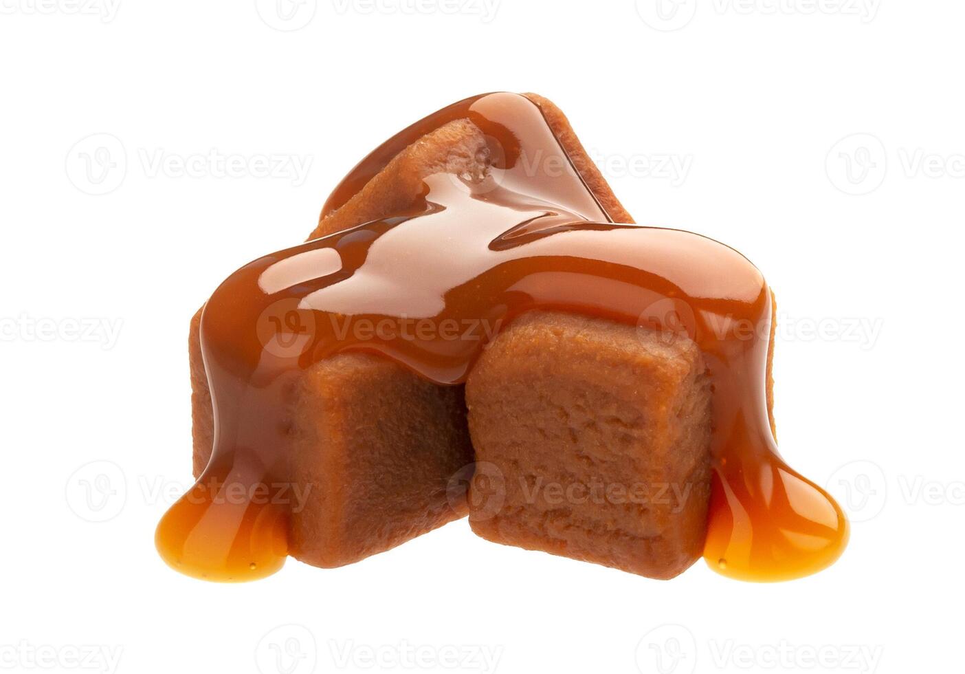 Caramel candies and caramel sauce isolated on white background photo