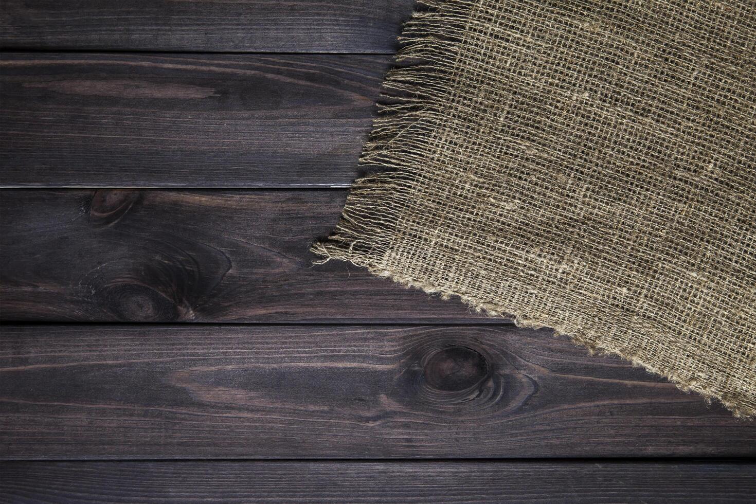 Hessian texture on wooden table photo