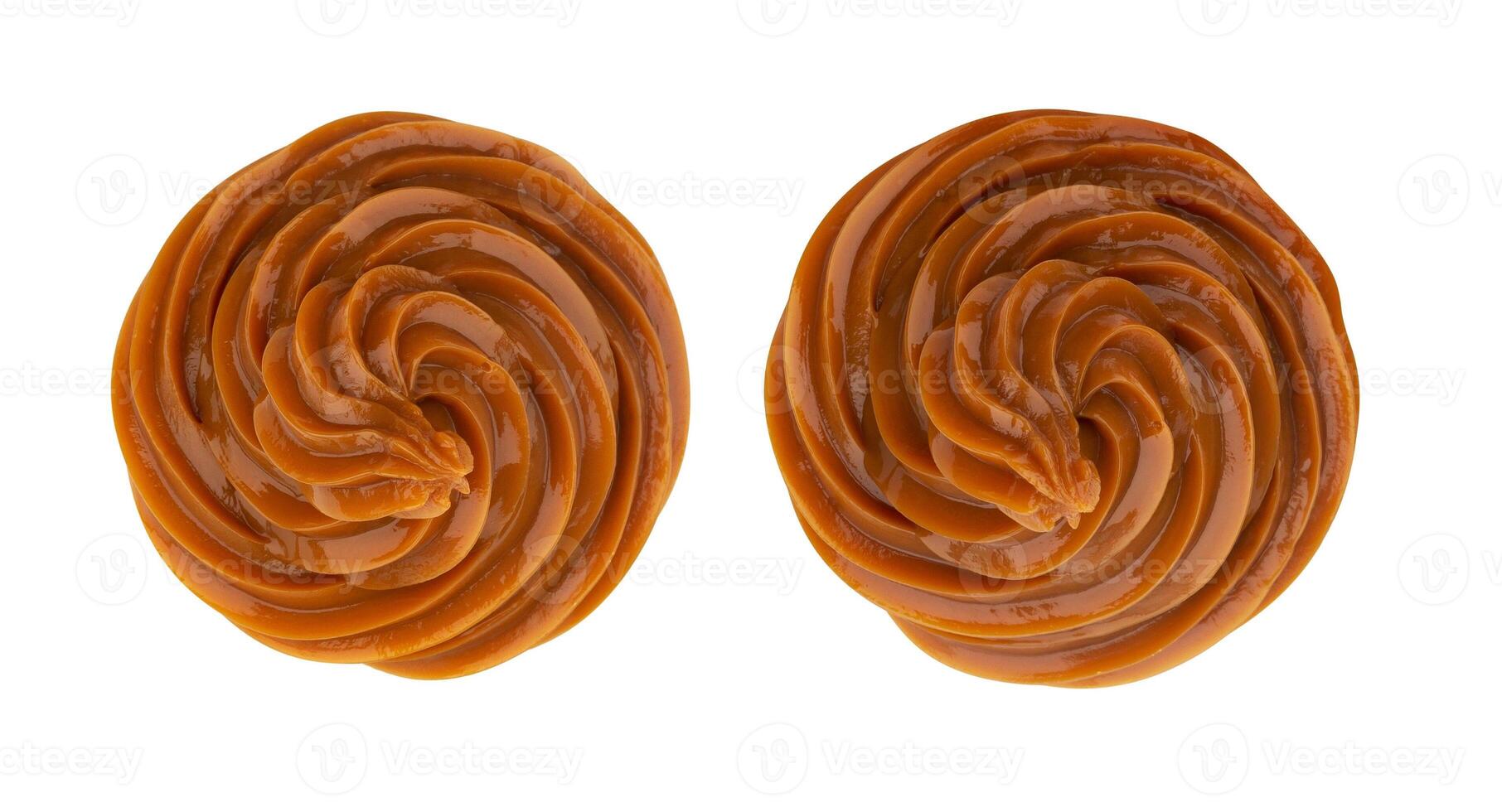 Swirl of caramel cream isolated on white background, top view photo