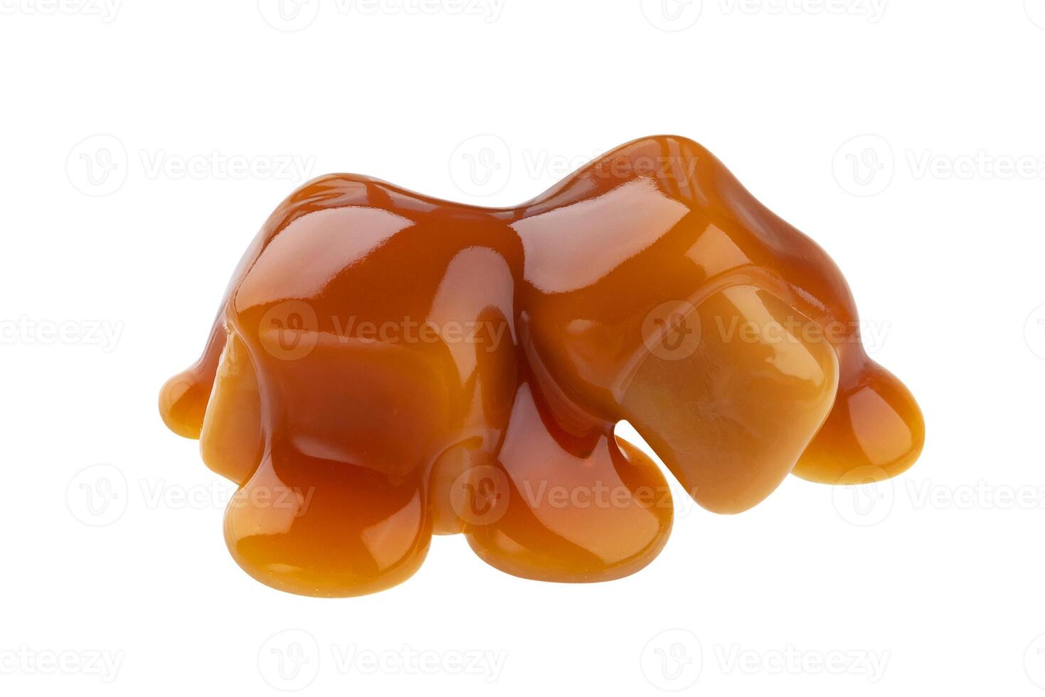 Caramel candies and caramel sauce isolated on white background photo