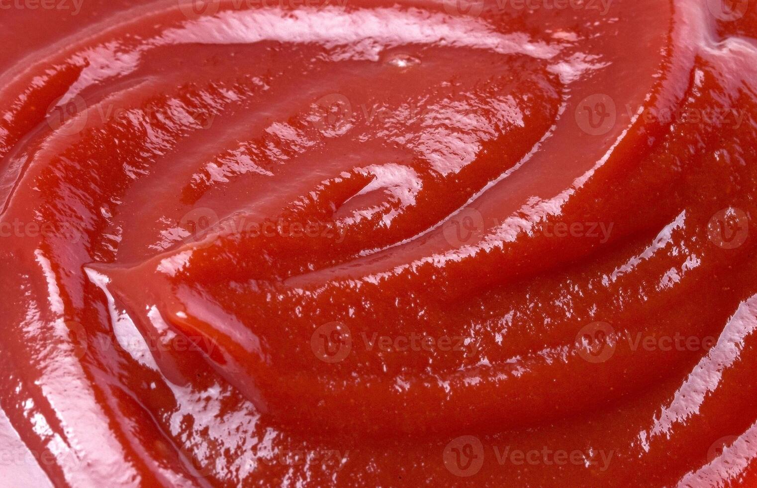 Close-up of ketchup or tomato sauce texture photo