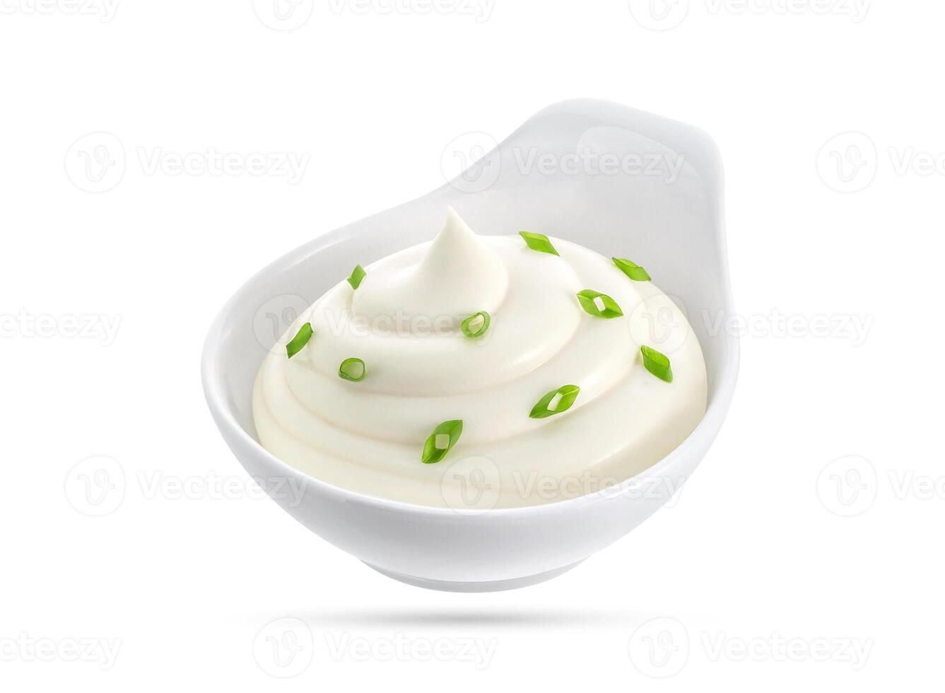 Sour cream and onion in bowl isolated on white photo