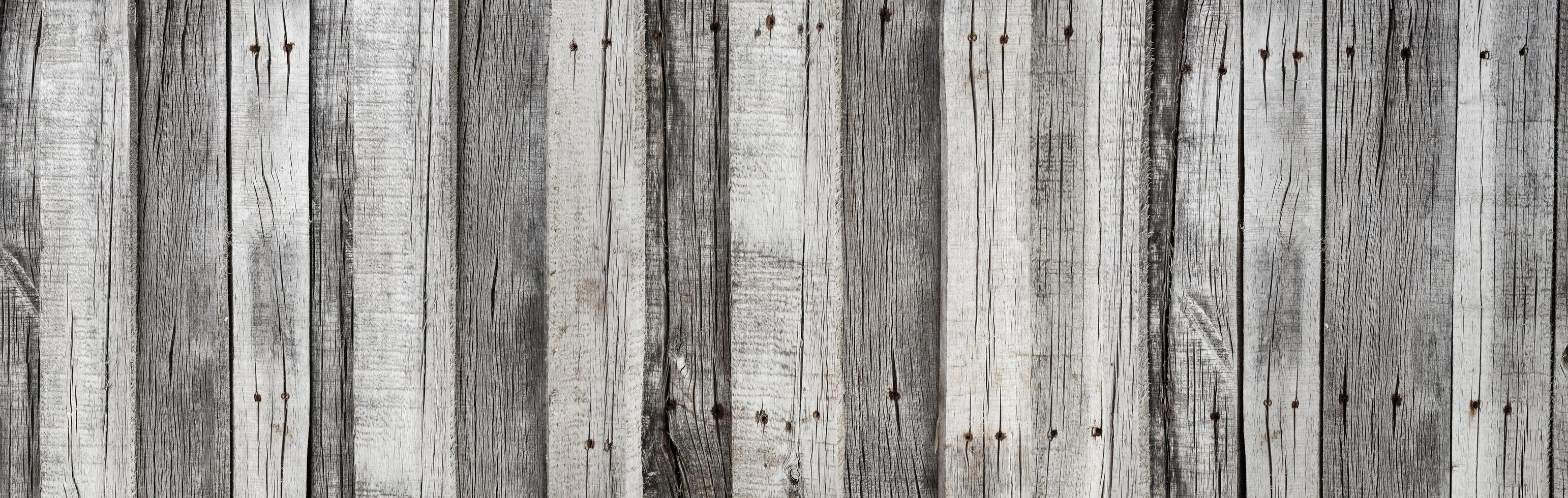 Fondo vertical de textura de tablones grises rústicos de madera foto