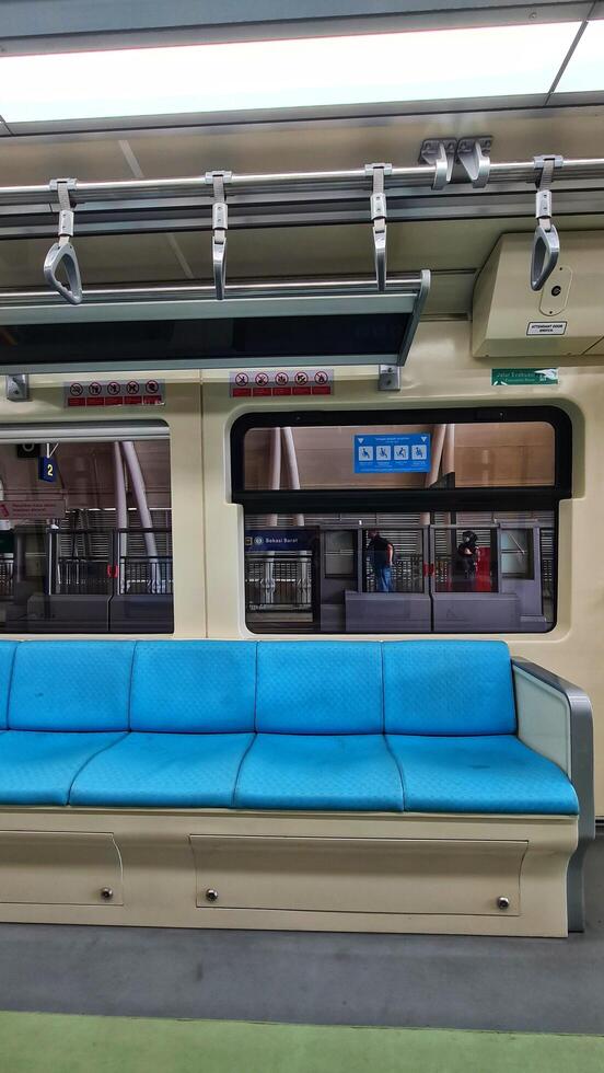 Jakarta, Indonesia on December 7, 2023. Interior of an Indonesian state-owned LRT Light Rail Transit photo