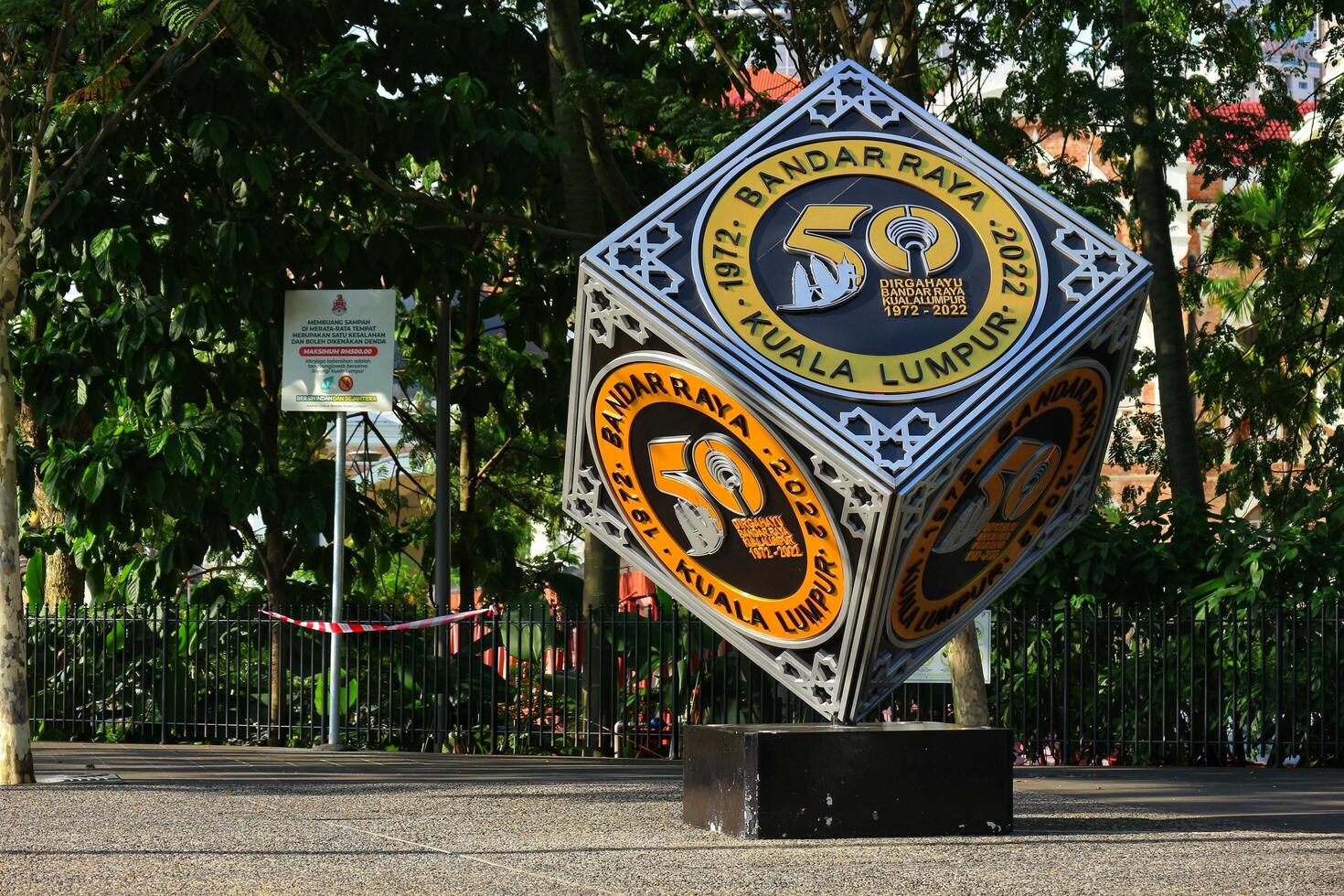 Kuala Lumpur, Malaysia on May 21 2023. A cube-shaped monument to commemorate Dirgahayu Bandar Raya Kuala Lumpur 1972 - 2022. Located in city center photo