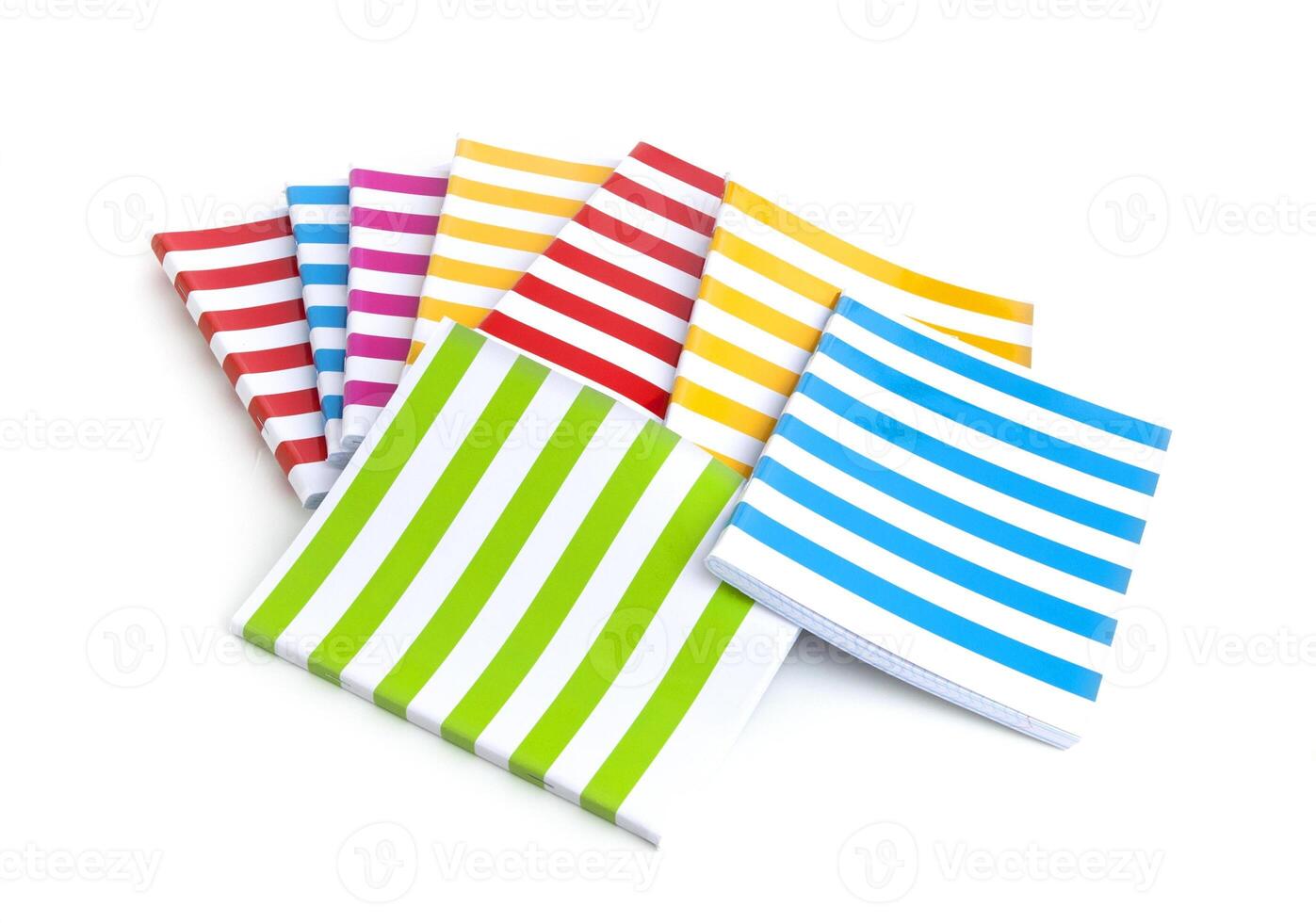 Color notebook isolated on white background photo