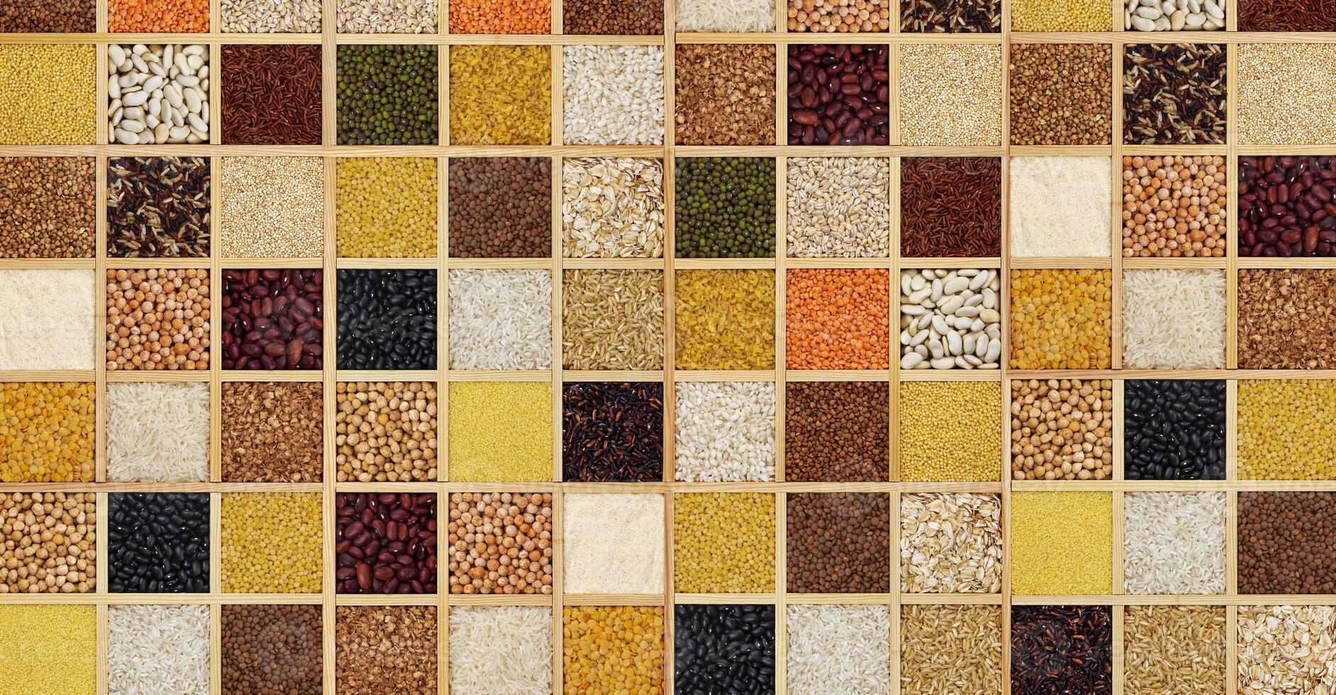 Groats in square wooden box, collection of cereals, beans and seeds, top view photo