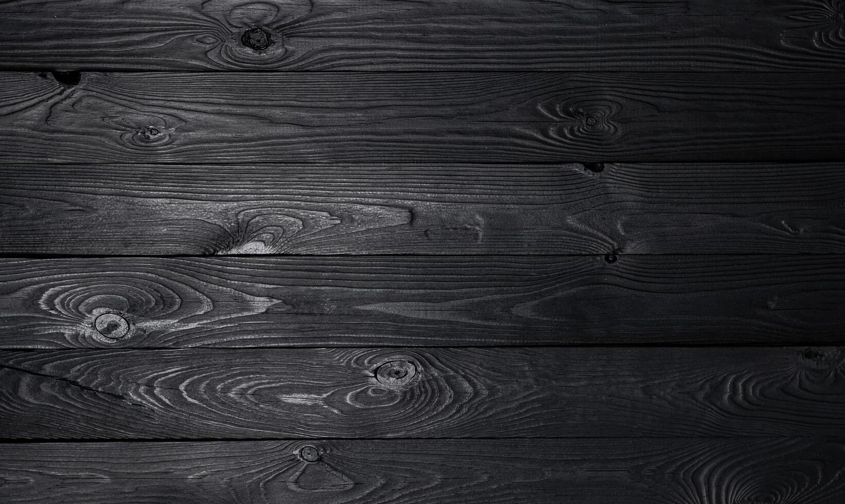 Black wooden background, old wooden planks texture photo