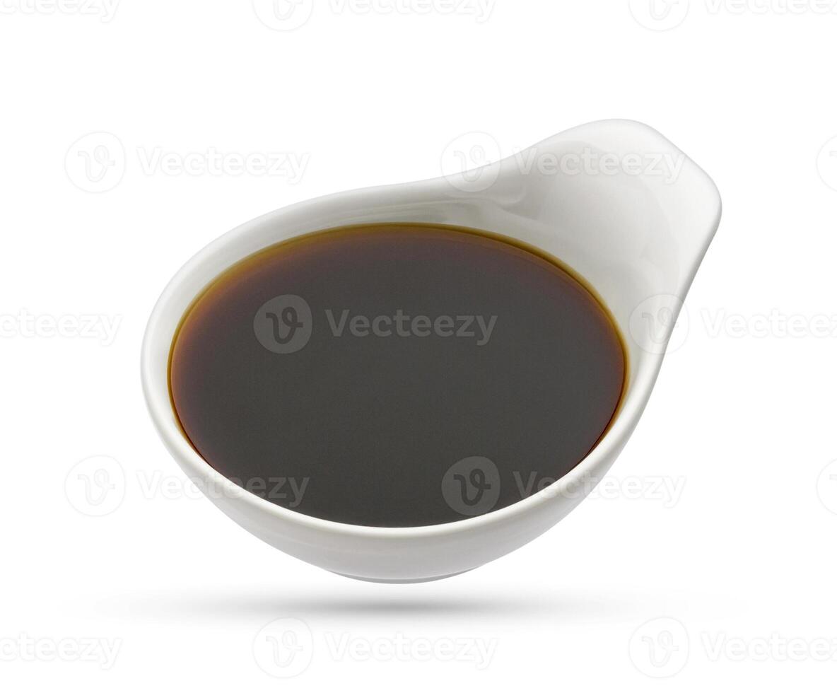 Bowl of soy sauce isolated on white, top view photo