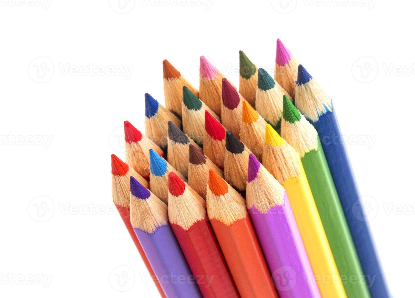 Colored pencils isolated on white background photo