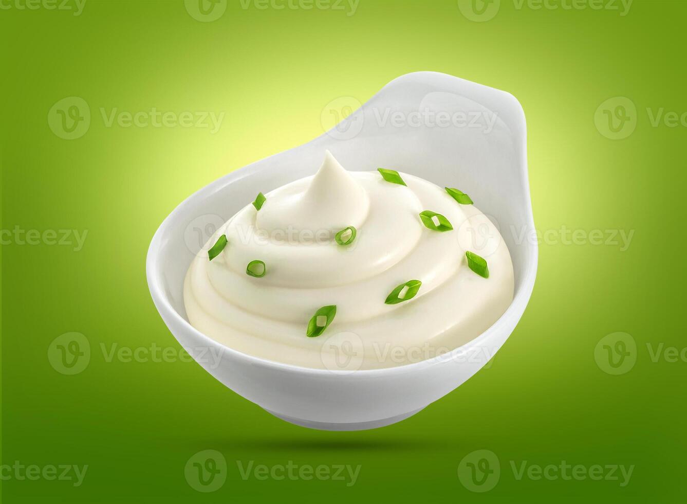 Bowl of sour cream isolated on white photo