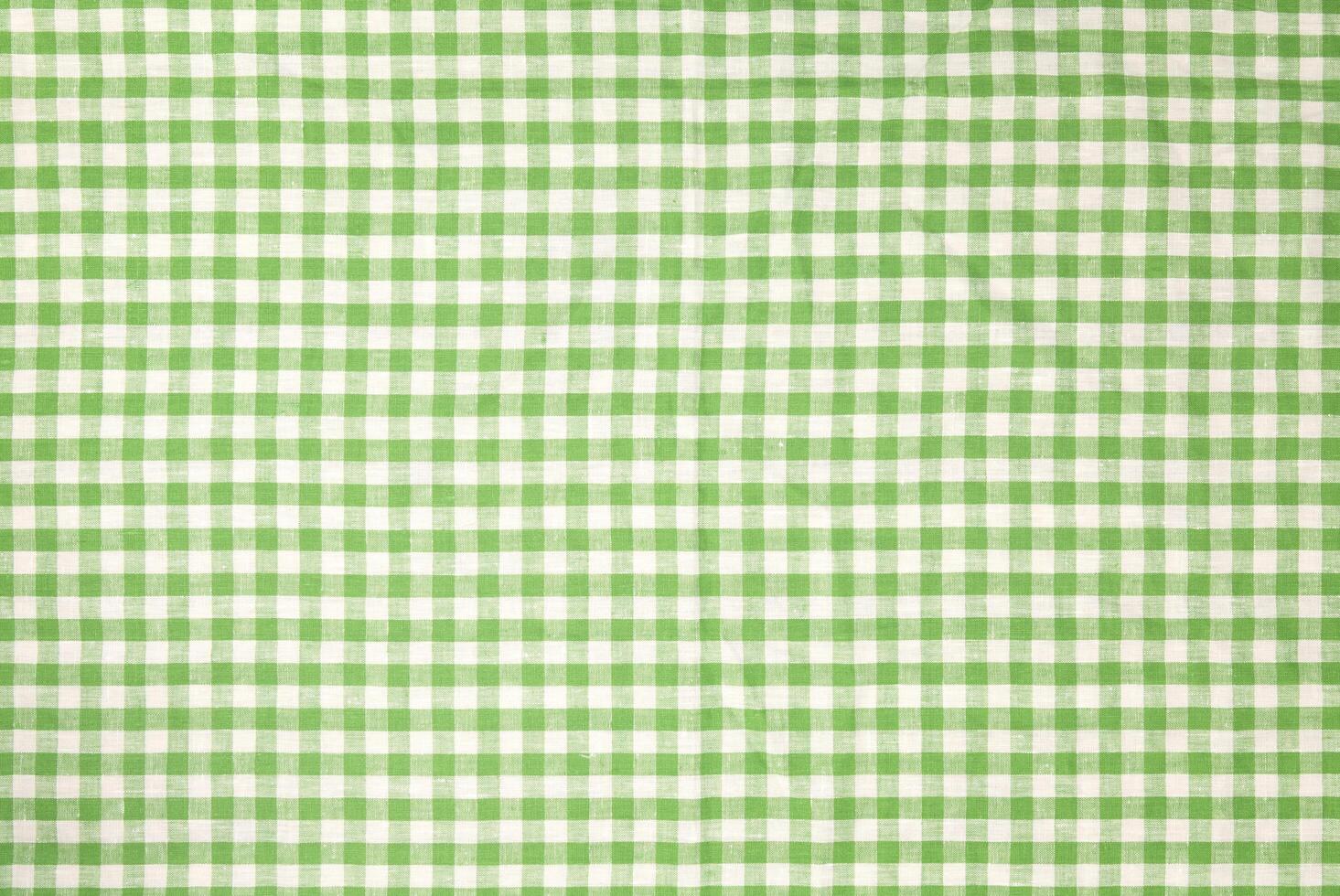 Green checkered tablecloth background photo