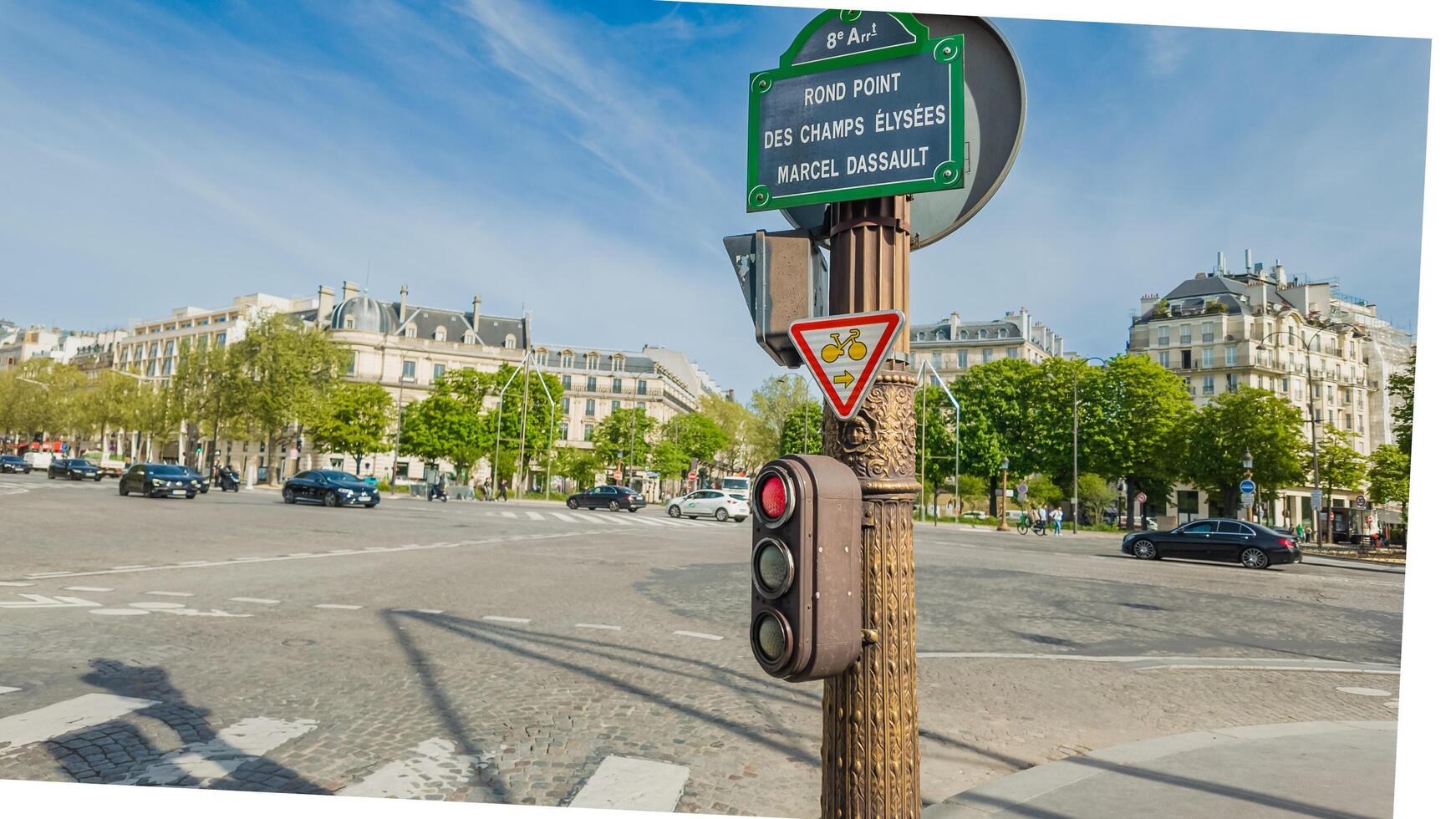 Springtime street view of Champs Elysees signpost and traffic light on a sunny day in Paris, France, shot on April 14th, 2024, relevant for travel and urban life photo