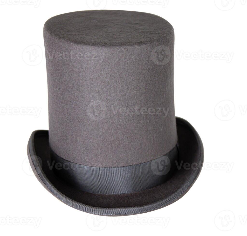 Magic hat. Topper. Elegant vintage gray beige wool felt top hat with black band. Grosgrain ribbon trim around rolled brim. Isolated on white background. Close-up. Copy space. Cut out. Clipping path. photo