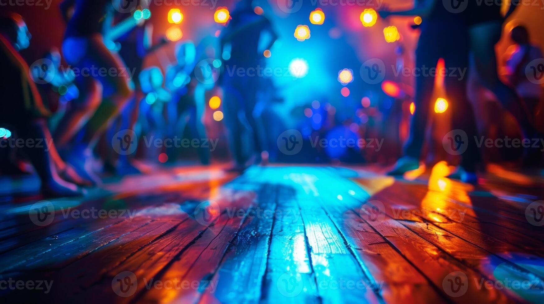 A funky dance floor packed with people grooving to the beats of a live band at a music venue that offers an impressive selection of alcoholfree options photo