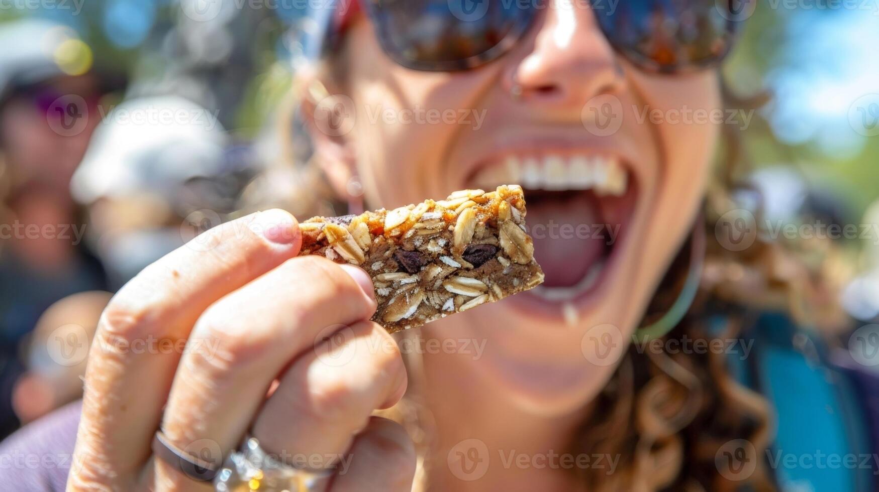 As one customer raves about the gingerberry blend another takes a bite out of their homemade energy bar photo