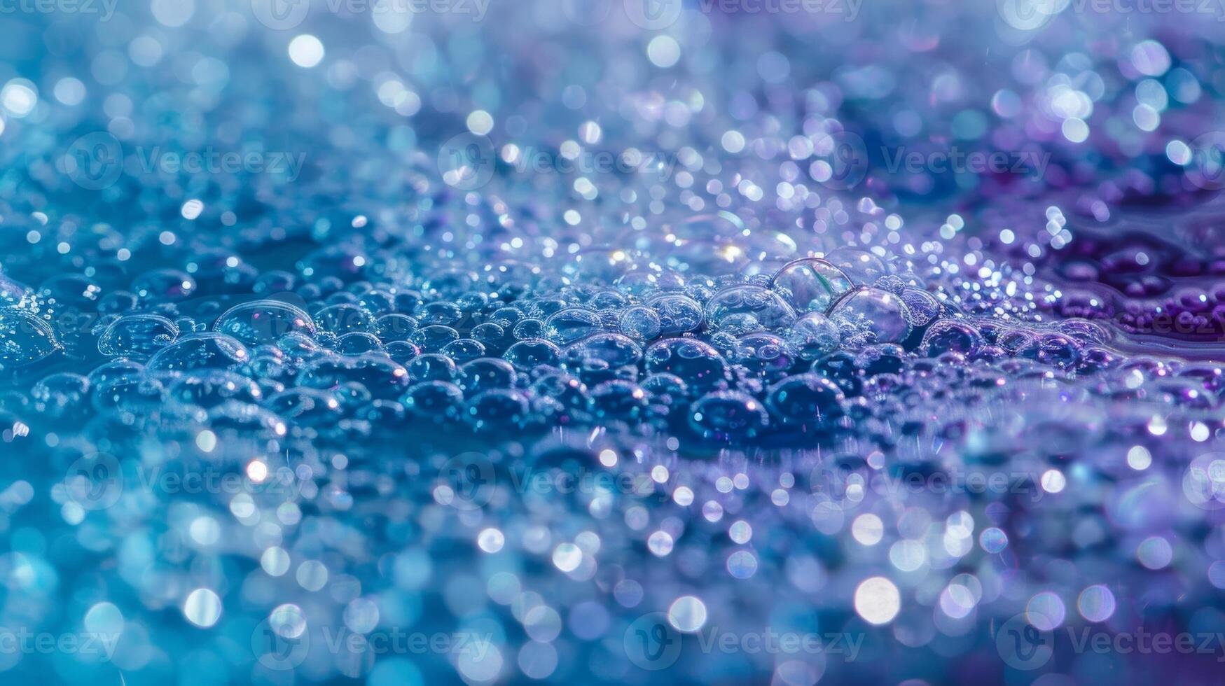 The water is sprinkled with small round bath salts in shades of blue and purple photo