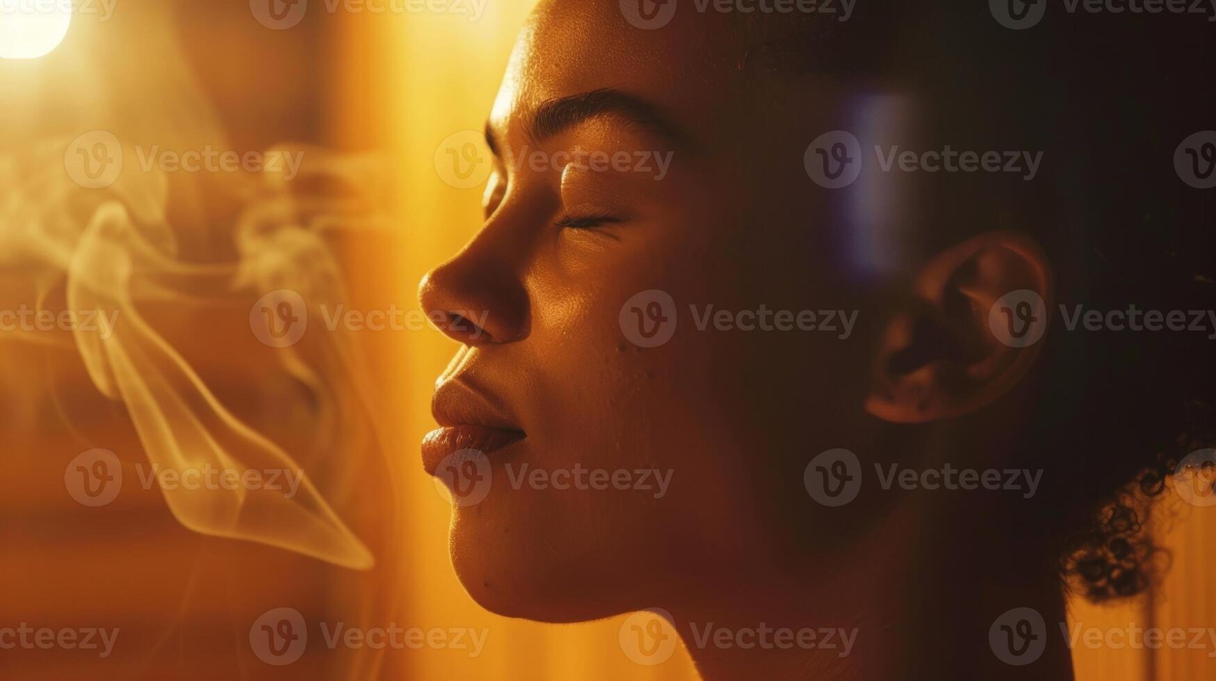 A person sits in the sauna their eyes closed in deep focus as they use mindfulness techniques to manage their chronic pain. photo