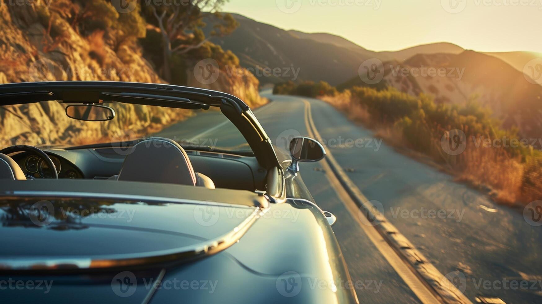 el emoción de devanado mediante escénico montaña carreteras en un lujoso convertible con el parte superior abajo foto