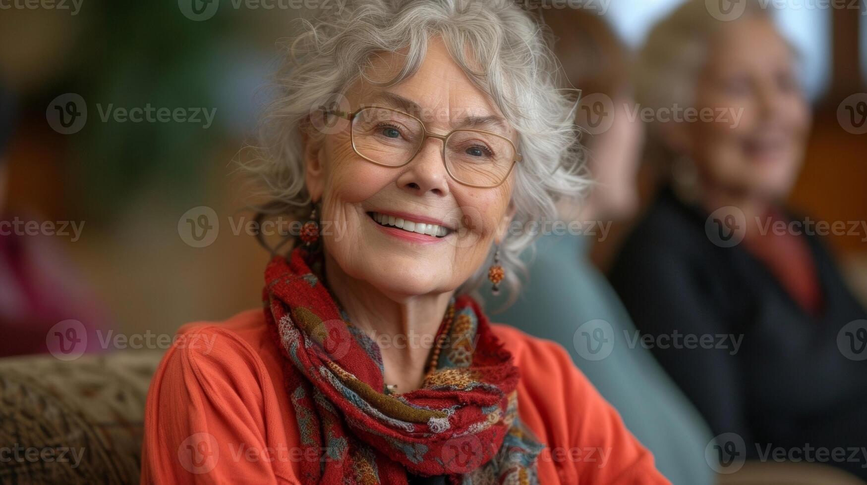 The book club members are all smiles as they chat animatedly their years of wisdom and life experiences adding depth to the conversation photo